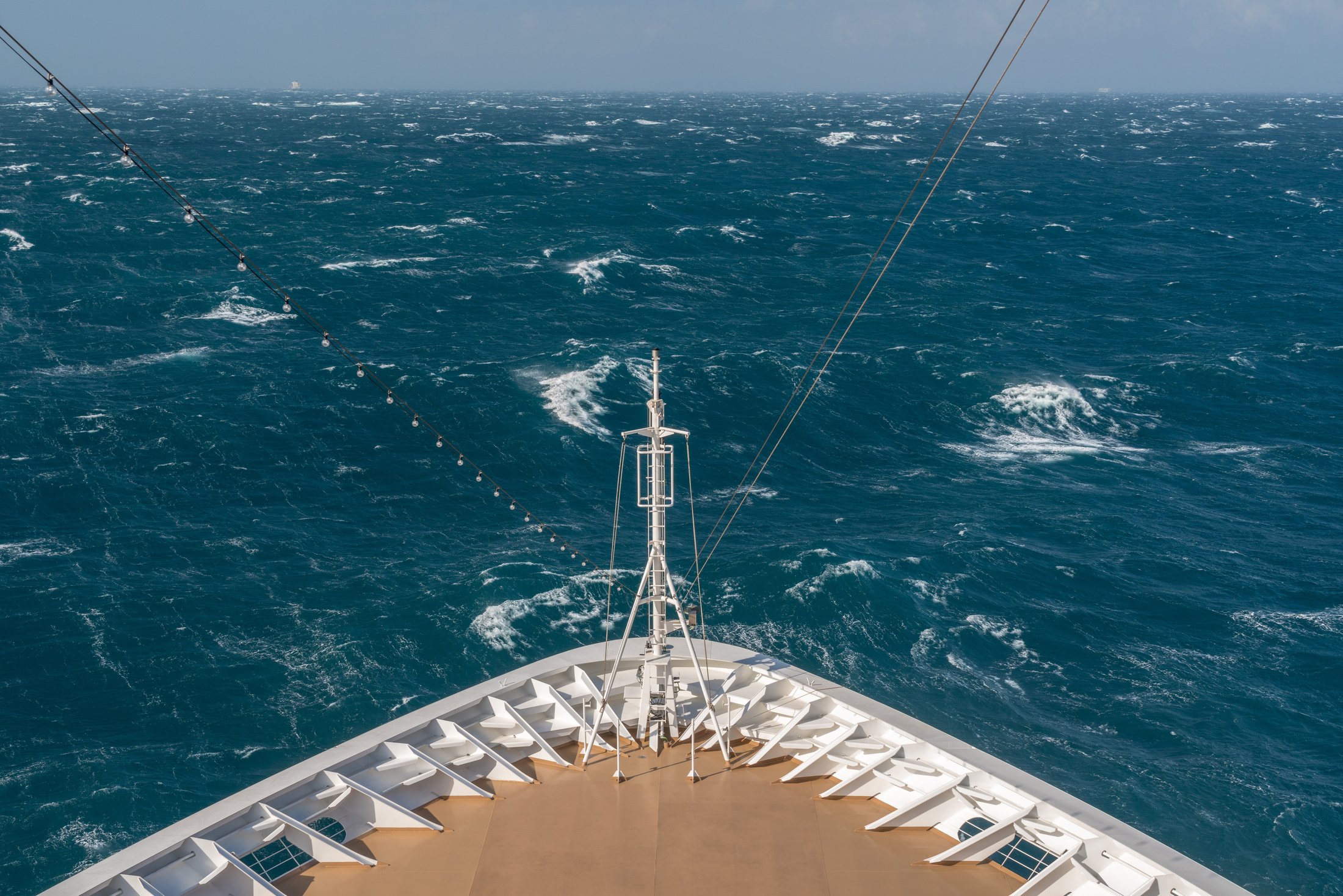 Modern Cruise Ship Traveling through Rough Seas